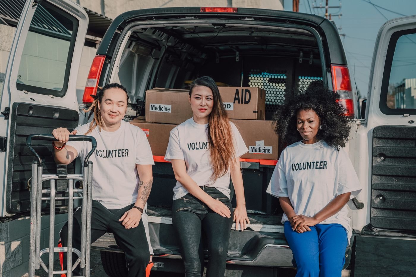 Community volunteers preparing medical aid for outreach